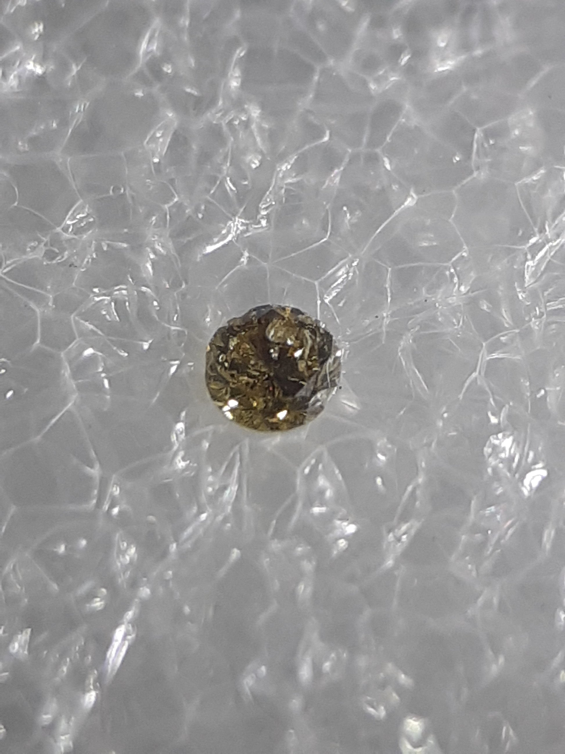 Certified Natural Diamond - Round Brilliant - 0.03ct - I2 - Natural Fancy Intense Brownish Yellow - sealed - Natural Gems Belgium