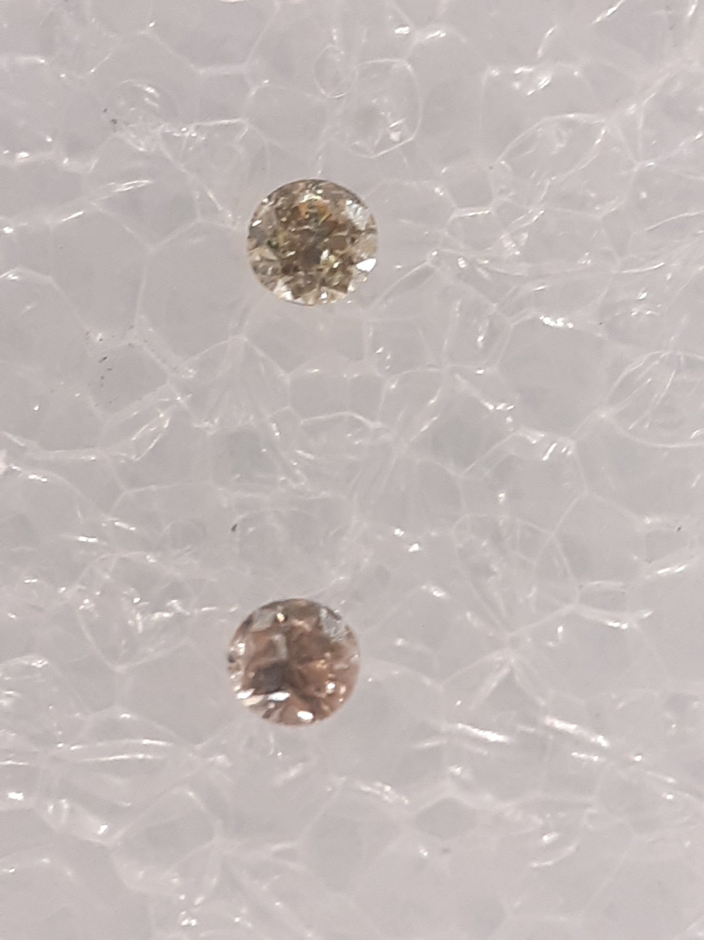 Certified Pair of Natural Diamonds - Round Brilliant - 0.06 tcw - I1/I2- color S /T - sealed - Natural Gems Belgium