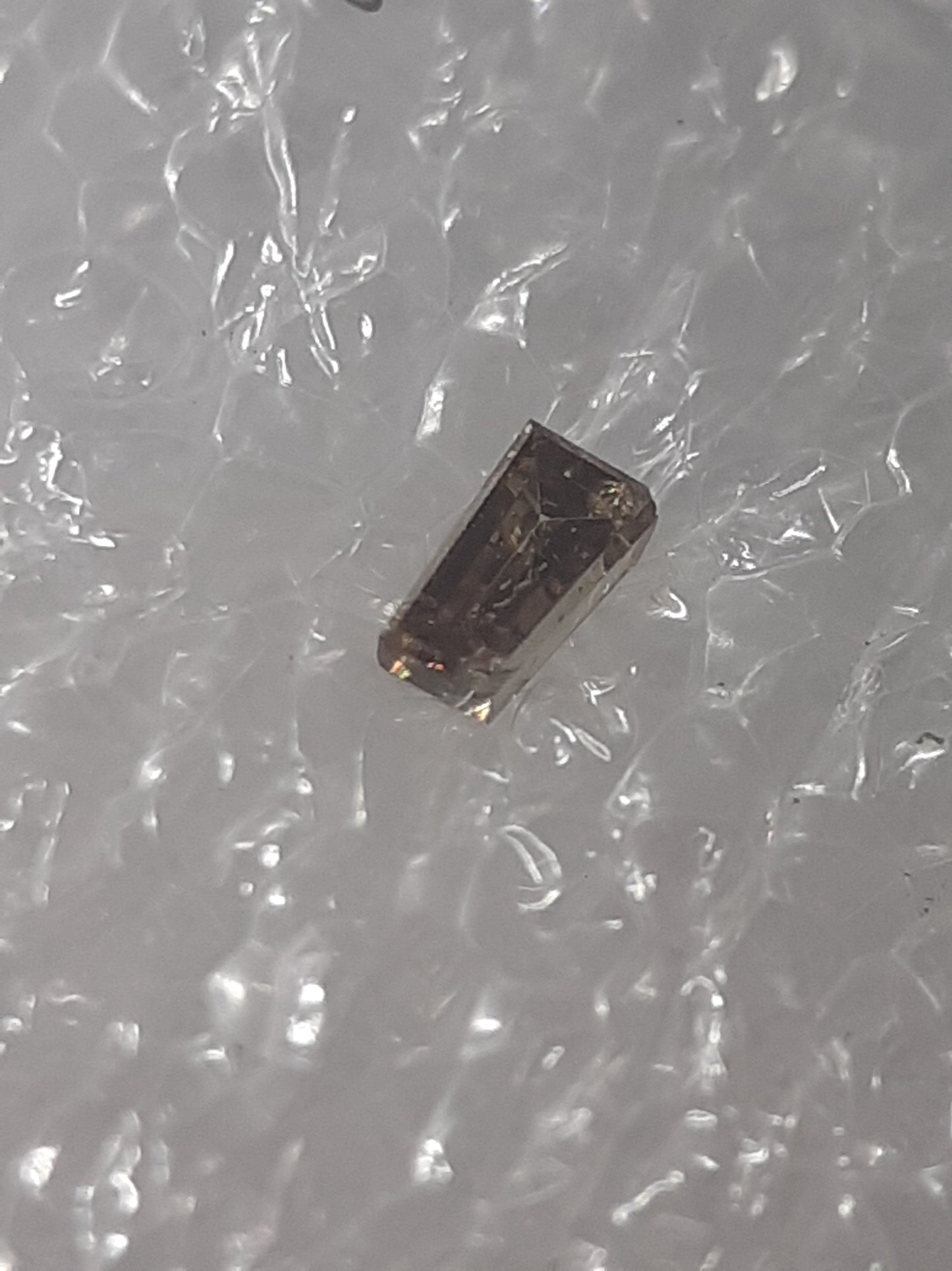 Natural diamond tapered baguette - 0.04ct - I1 - fancy deep yellowish brown - sealed - Natural Gems Belgium