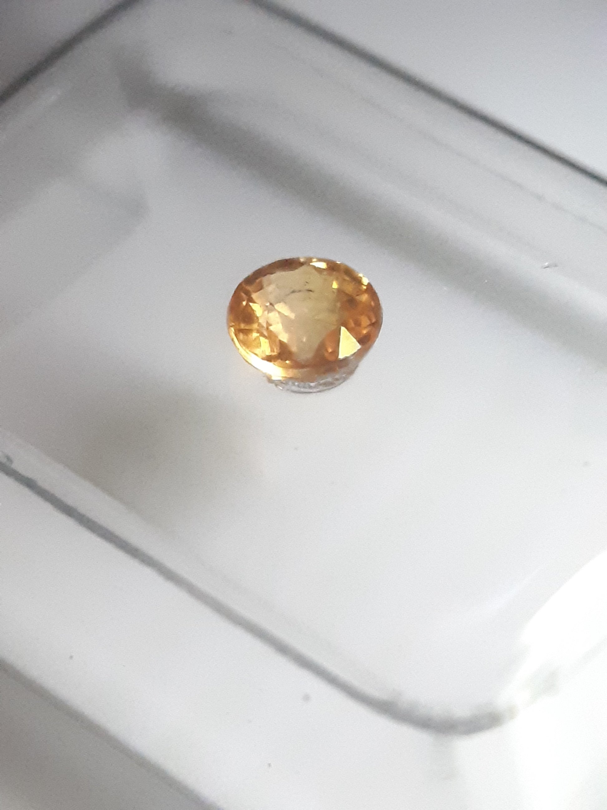 Certified round brilliant Spessartite "mandarin" Garnet - 0.40 ct - Sealed - Natural Gems Belgium