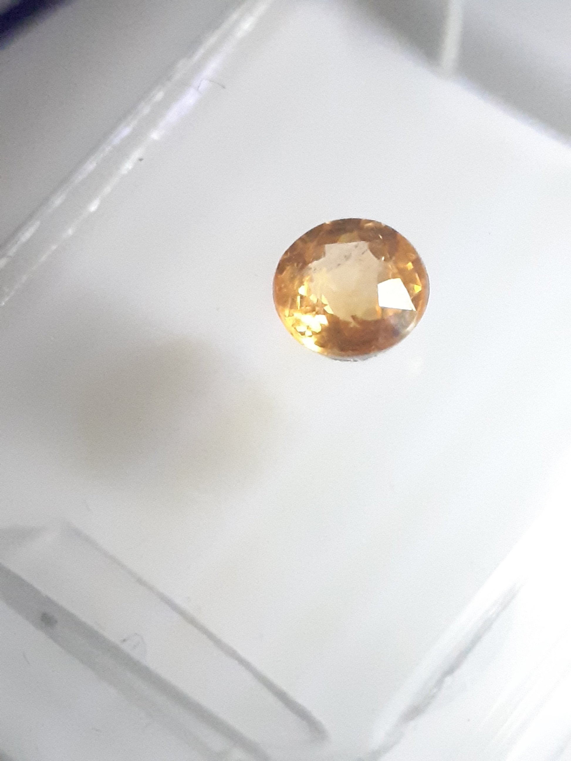 Certified round brilliant Spessartite "mandarin" Garnet - 0.40 ct - Sealed - Natural Gems Belgium