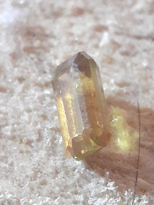 natural light brownish greenish Yellow octagon Sphene, 0.65 ct - Natural Gems Belgium