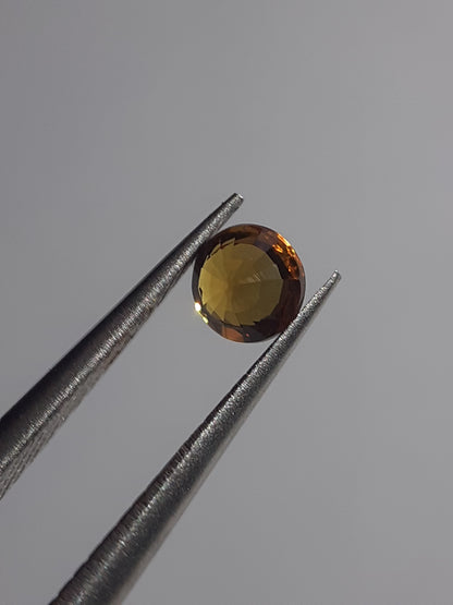 Natural orangy Yellow Sapphire - 0.34ct - round - Beryllium treated - Certified by NGB - Natural Gems Belgium