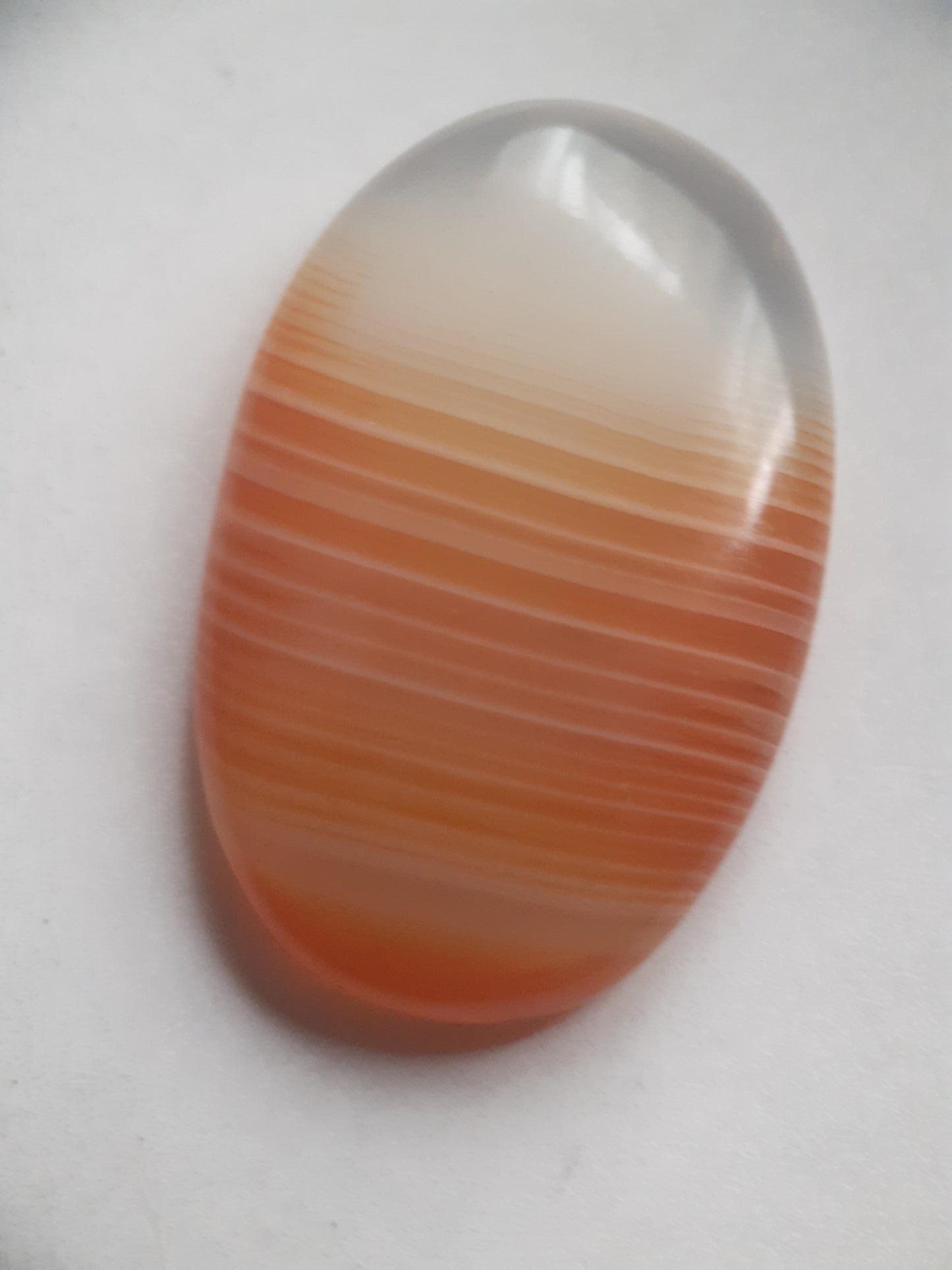 Natural orangy red Lake Superior Agate - 34.45 ct - Oval Cabochon - unheated - certified by NGB - Natural Gems Belgium