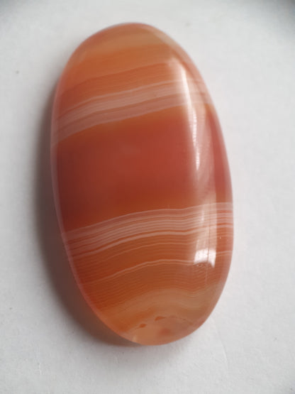 Natural orangy red Lake Superior Agate - 48.53 ct - long oval Cabochon - unheated - certified by NGB - Natural Gems Belgium