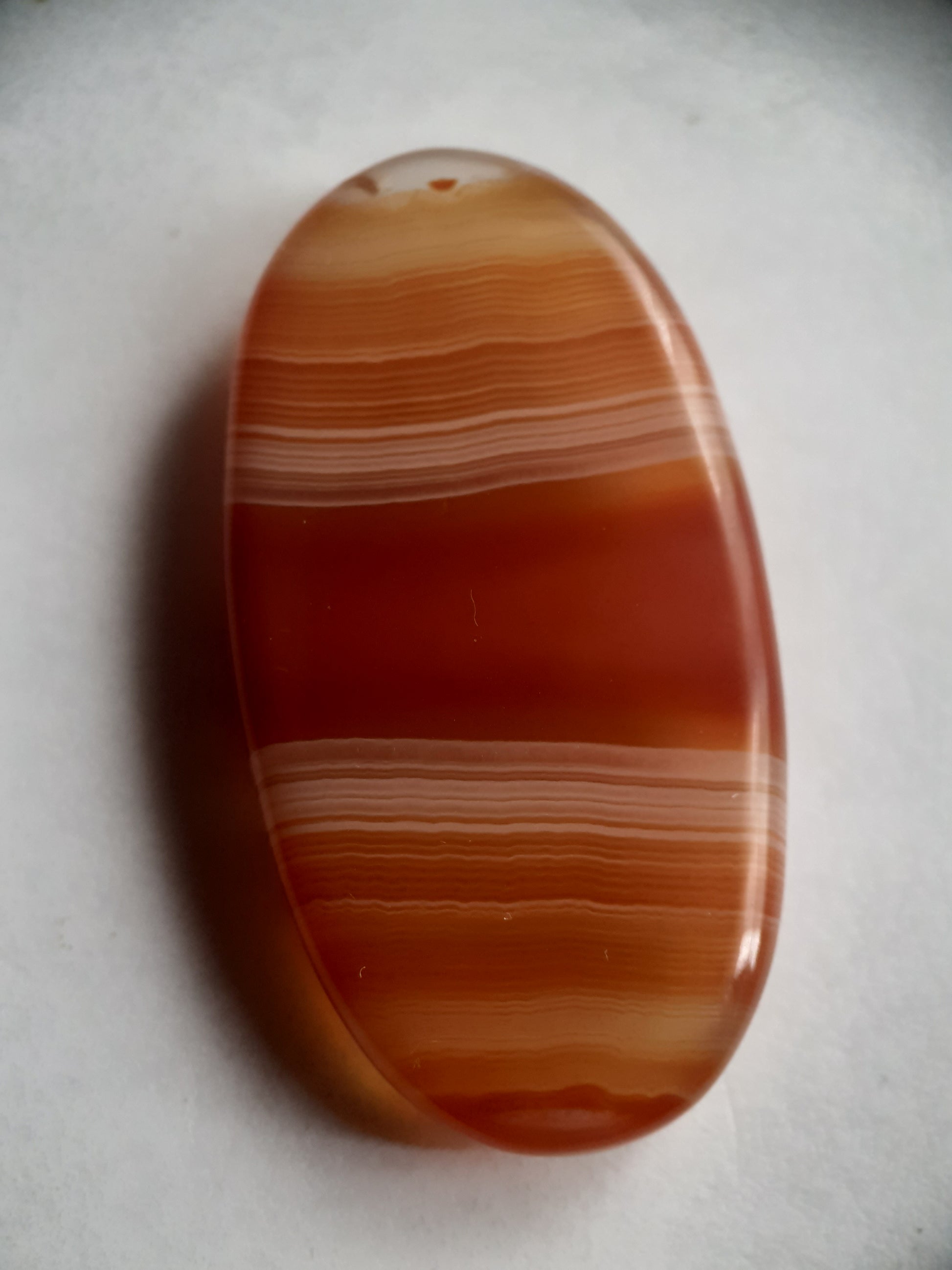 Natural orangy red Lake Superior Agate - 48.53 ct - long oval Cabochon - unheated - certified by NGB - Natural Gems Belgium