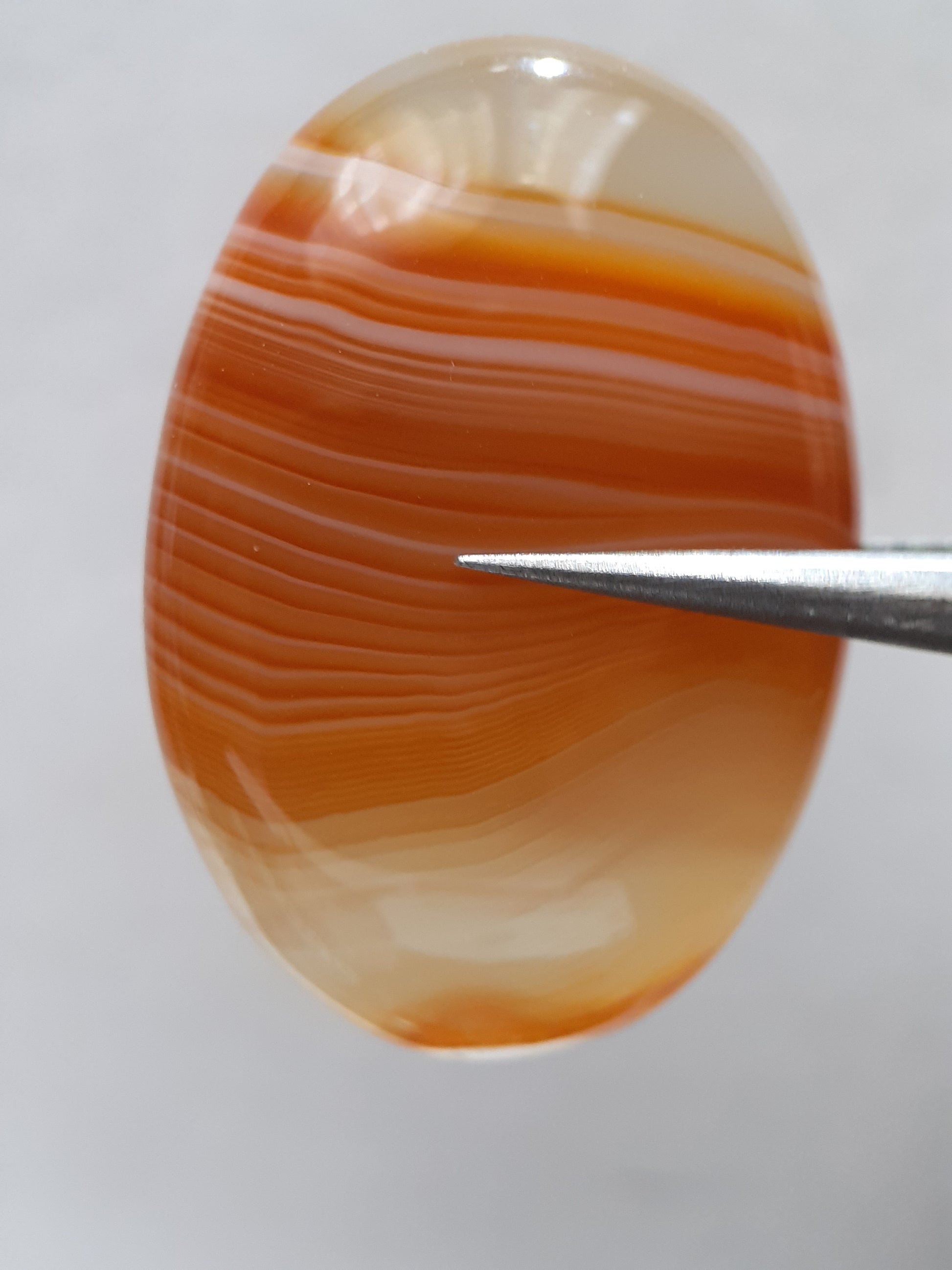 Natural orangy red Lake Superior Agate - 37.78 ct - oval Cabochon - unheated - certified by NGB - Natural Gems Belgium