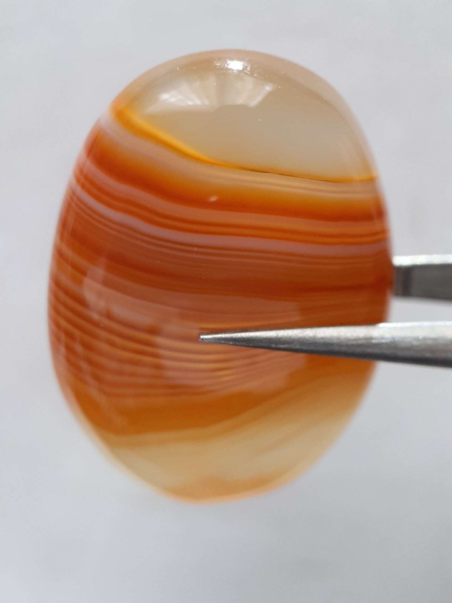 Natural orangy red Lake Superior Agate - 37.78 ct - oval Cabochon - unheated - certified by NGB - Natural Gems Belgium