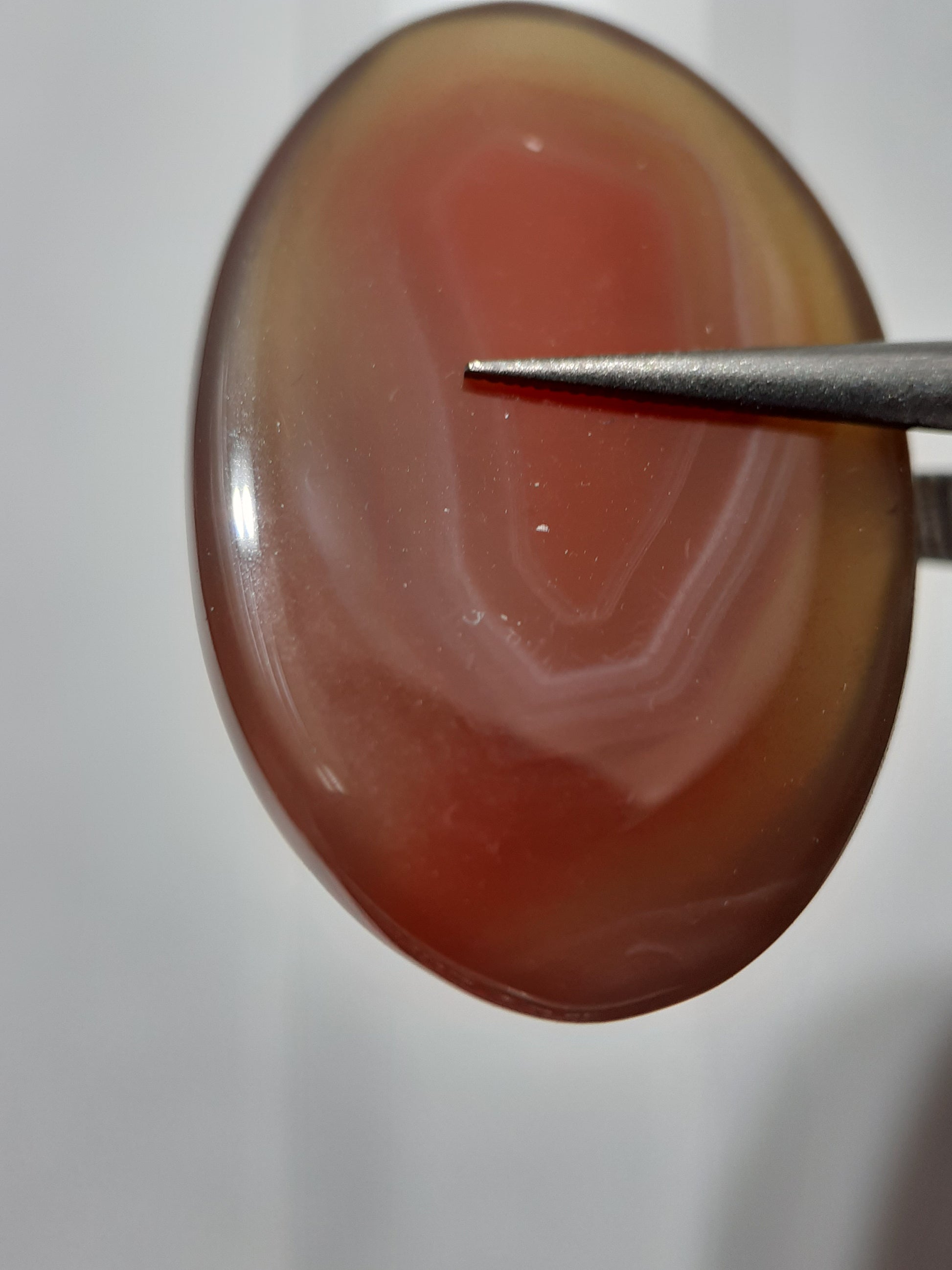 Natural brownish red Botswana Agate - 24.46 ct - oval Cabochon - unheated - certified by NGB - Natural Gems Belgium