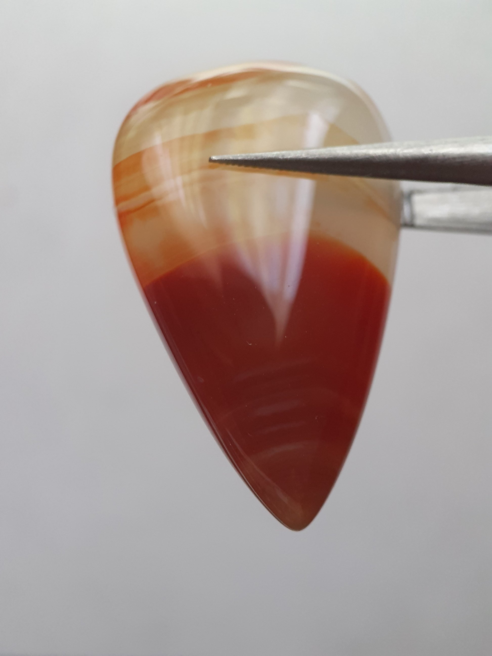 Natural deep brownish red and orange Lake Superior Agate - 23.96 ct - pear Cabochon - unheated - certified by NGB - Natural Gems Belgium