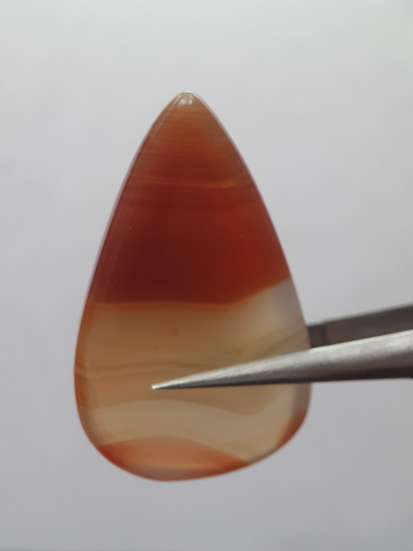 Natural deep brownish red and orange Lake Superior Agate - 23.96 ct - pear Cabochon - unheated - certified by NGB - Natural Gems Belgium