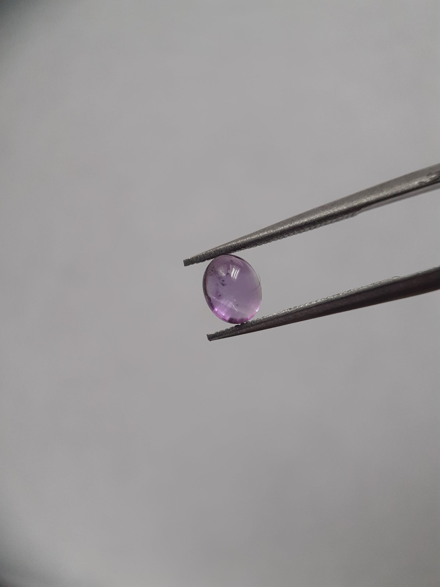 Natural purple Amethyst - 0.35 ct - oval cabochon - 5.1 x 4.1 mm - unheated - Natural Gems Belgium