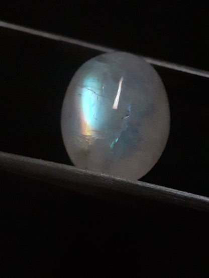 Natural Moonstone - greenish blue adularescence - 13.385 ct - oval cabochon - Natural Gems Belgium