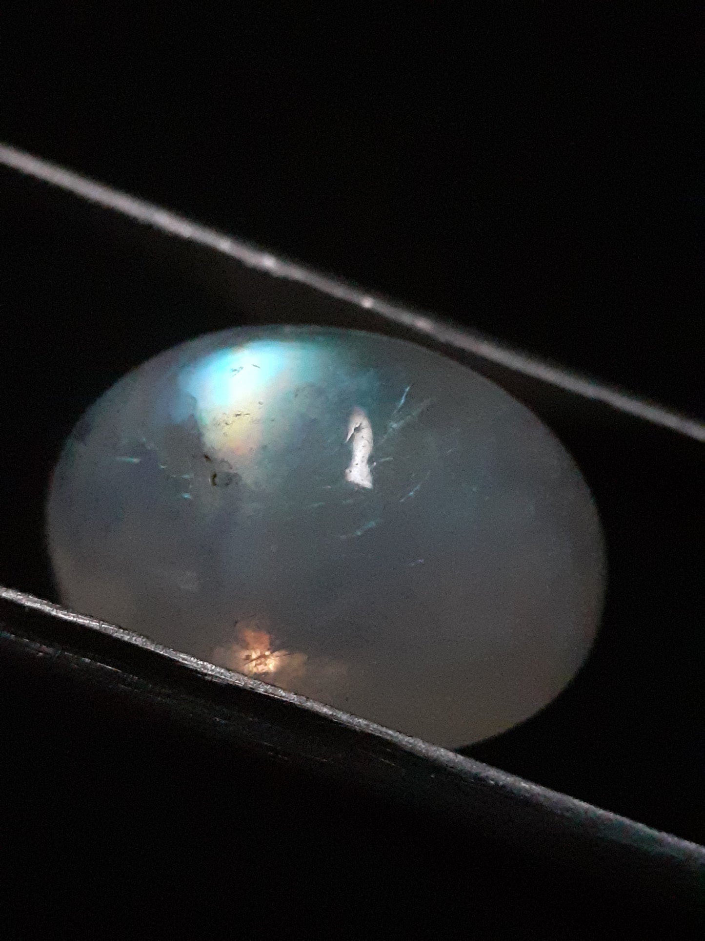 Natural Moonstone - greenish blue adularescence - 13.385 ct - oval cabochon - Natural Gems Belgium