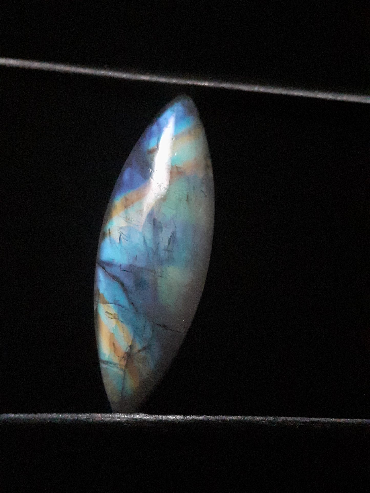 Natural Moonstone - rainbow adularescence - 7.535 ct - marquise cabochon - Natural Gems Belgium