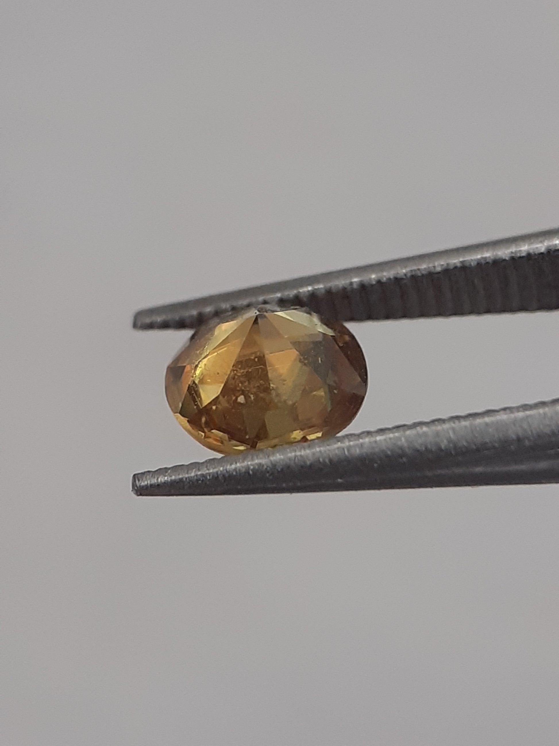 Natural yellow shpene - 0.455 ct - round - unheated - Natural Gems Belgium