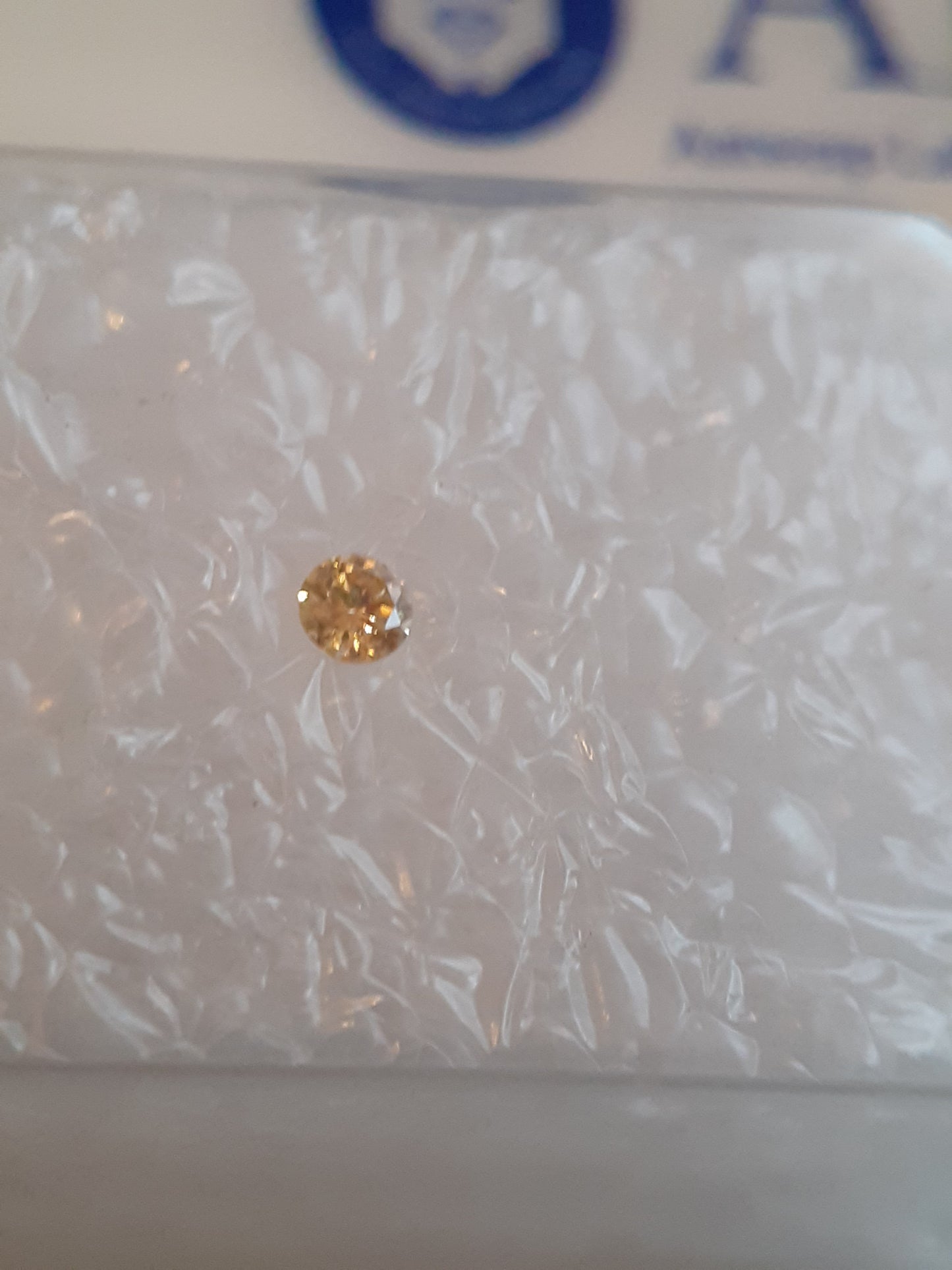 Natural Yellow Diamond - Round , 0.03 ct - Sealed - Light brownish Yellow, very good polish