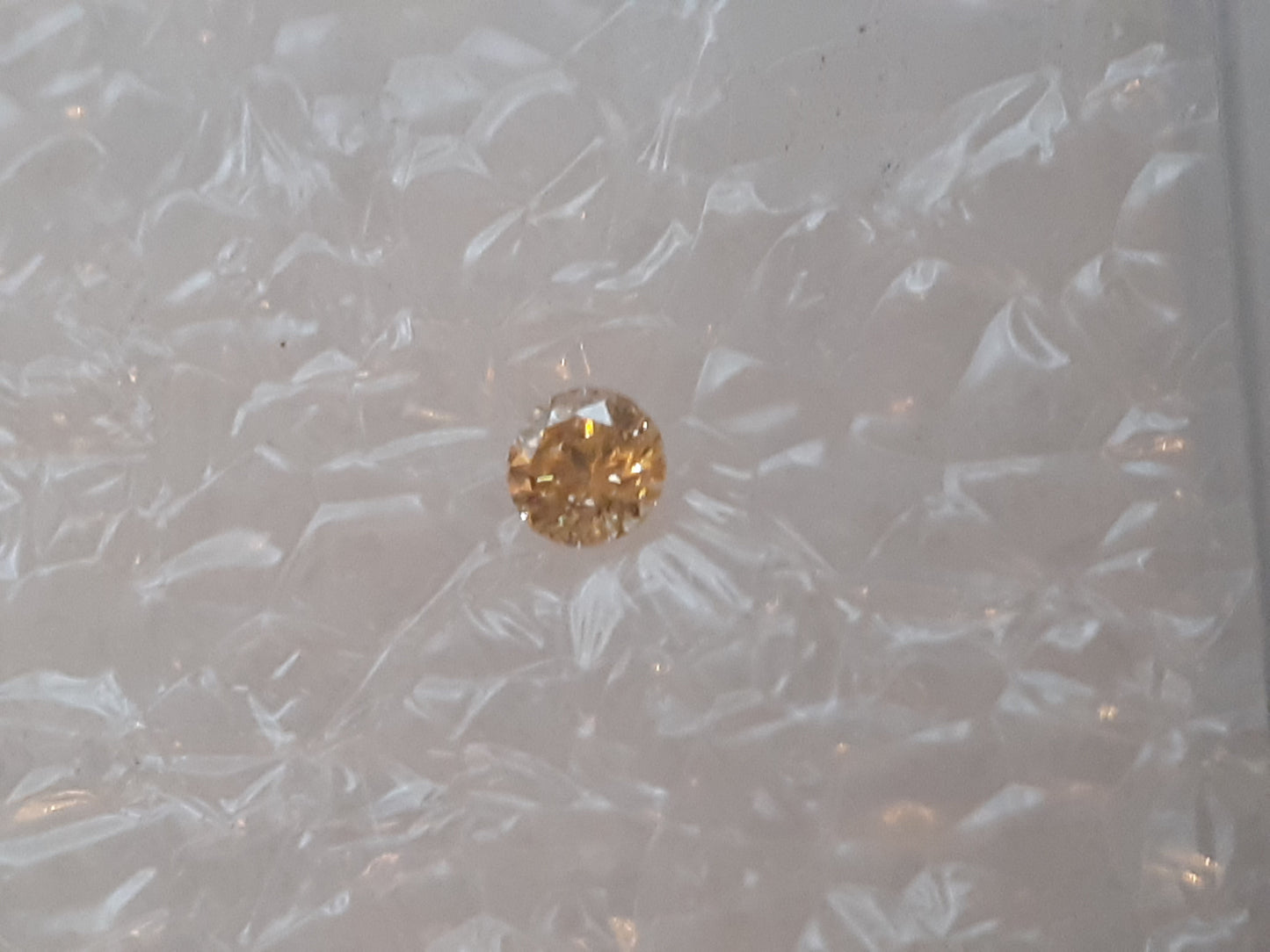 Natural Yellow Diamond - Round , 0.03 ct - Sealed - Light brownish Yellow, very good polish