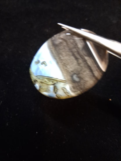 Natural Owyhee Blue Opal Cabochon - 50.141 ct - moss included - oval - scenic pattern