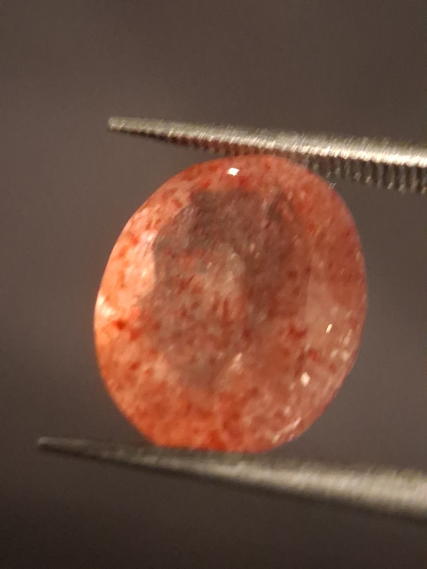 Natural orangey pink strawberry quartz - 4.453 ct - oval - Africa