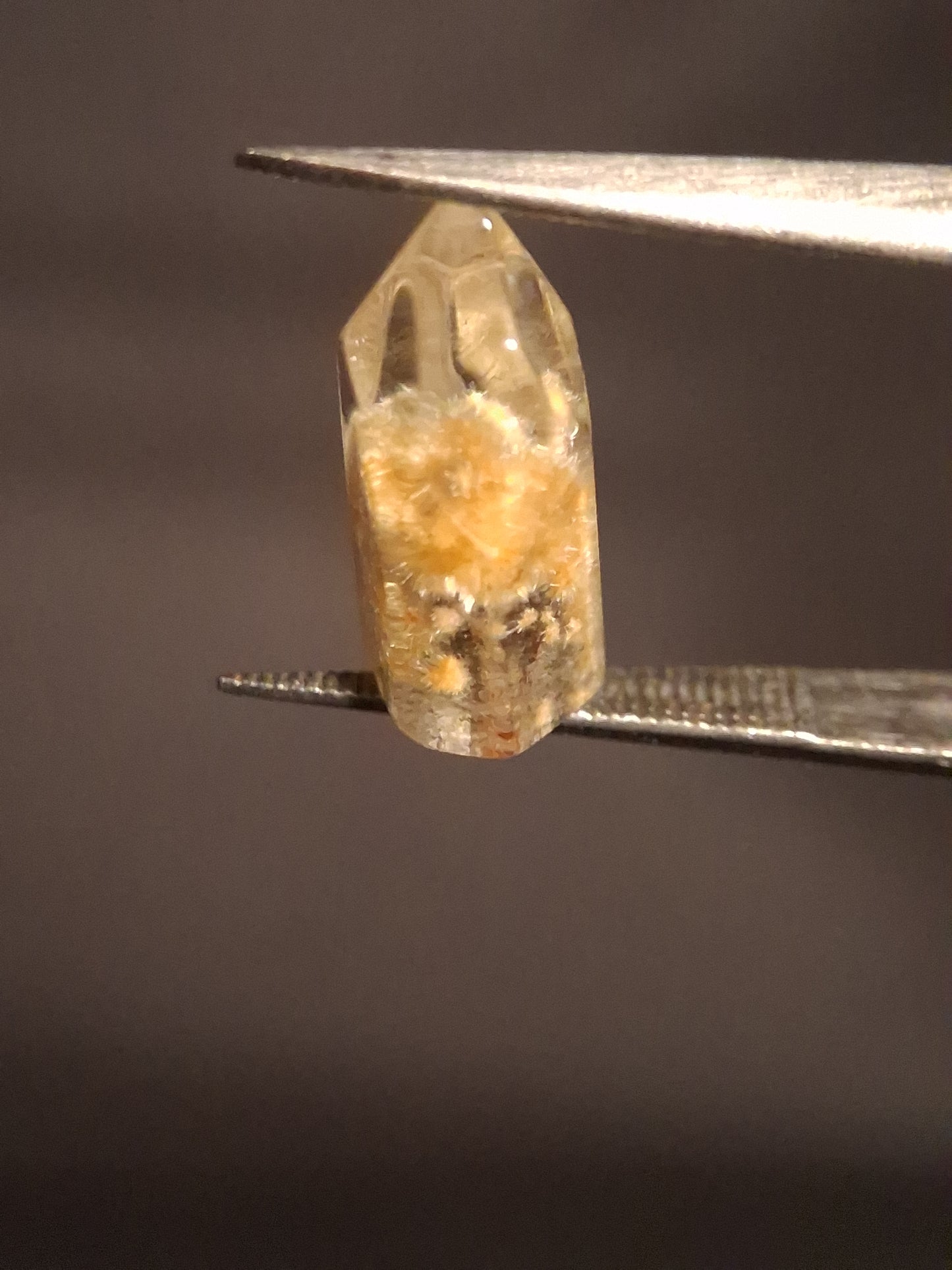 Crystal point of Phantom Quartz - Yellow to orange inclusions - collectors item