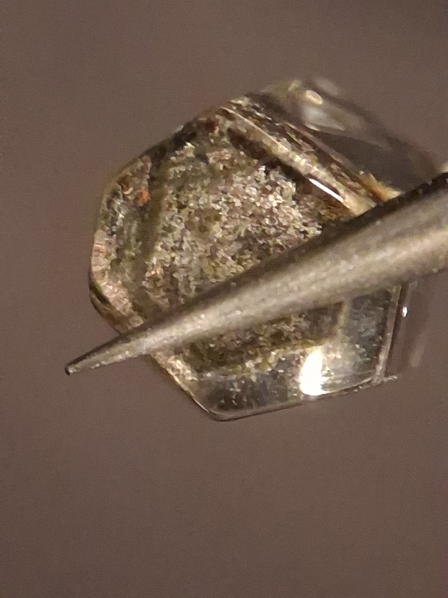 Crystal point of Phantom Quartz - gardenscape yellow flower in desert - collectors item