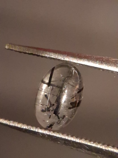 Natural Rutilated Quartz - oval cabochon - black rutile quartz - 0.455 ct