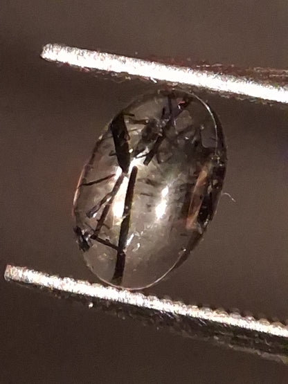Natural Rutilated Quartz - oval cabochon - black rutile quartz - 0.480 ct