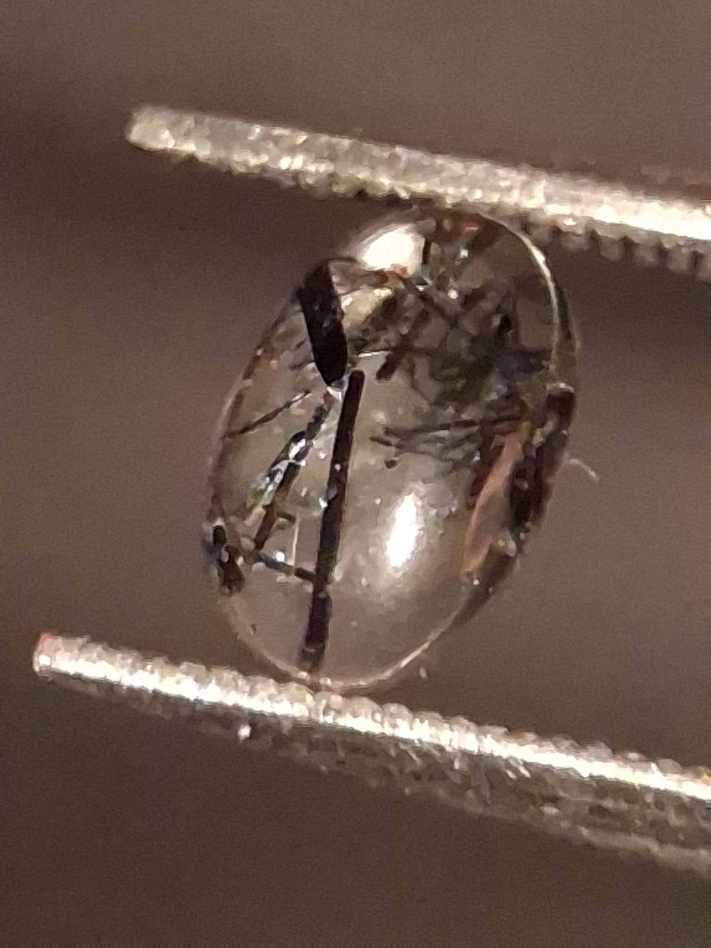 Natural Rutilated Quartz - oval cabochon - black rutile quartz - 0.480 ct