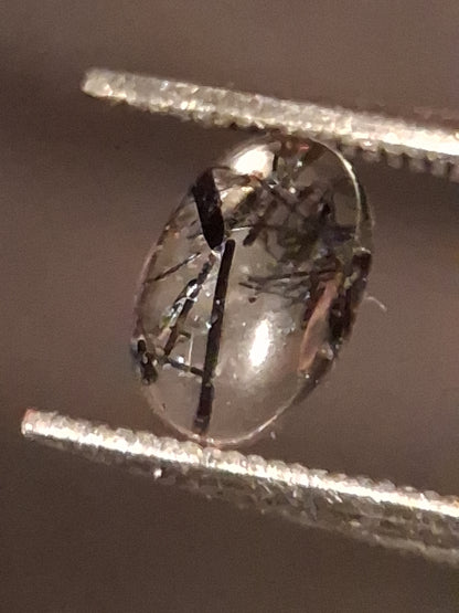 Natural Rutilated Quartz - oval cabochon - black rutile quartz - 0.480 ct