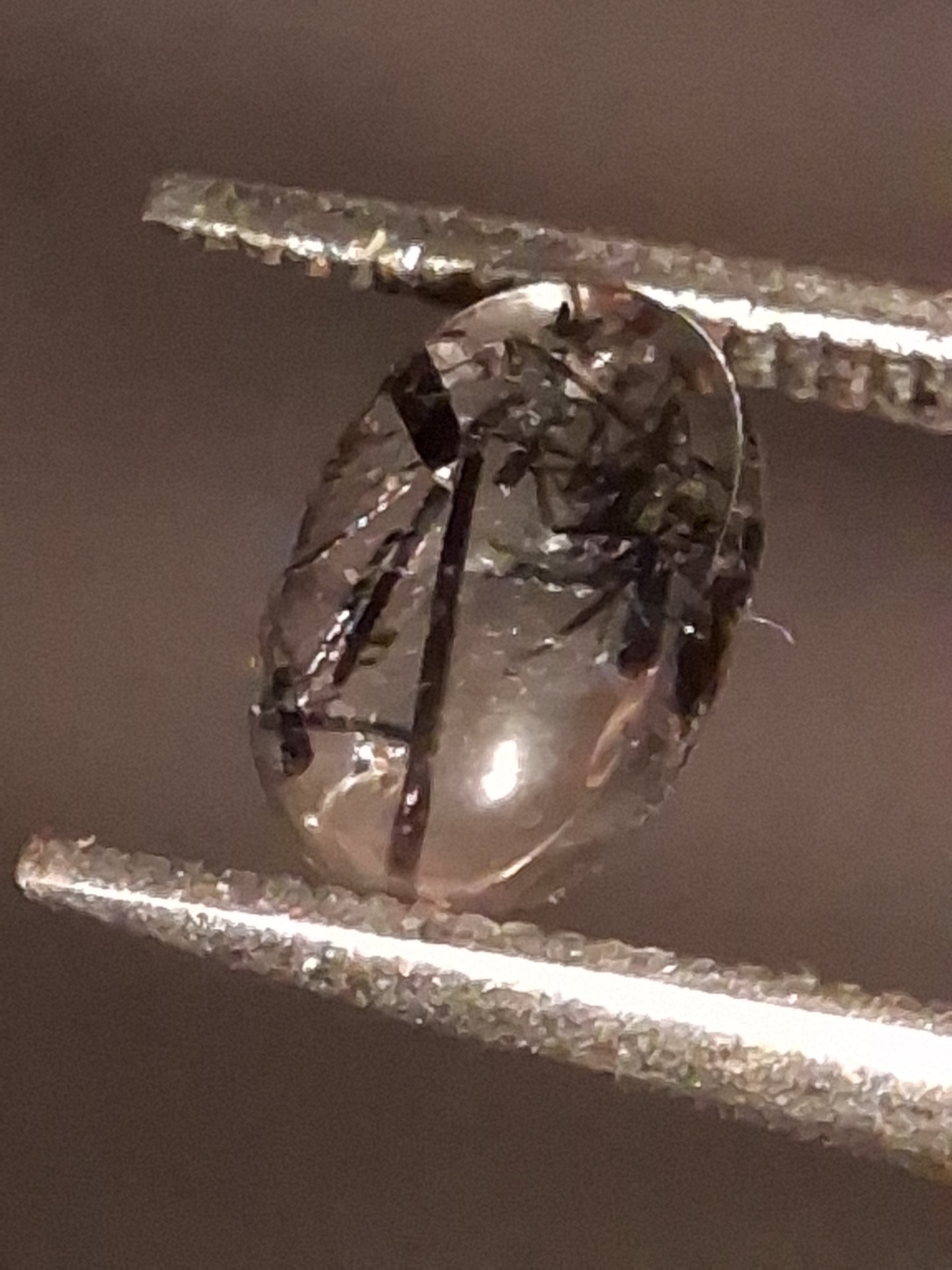 Natural Rutilated Quartz - oval cabochon - black rutile quartz - 0.480 ct