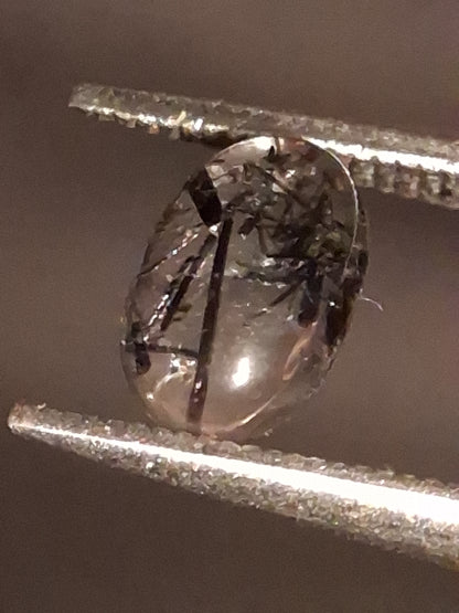 Natural Rutilated Quartz - oval cabochon - black rutile quartz - 0.480 ct