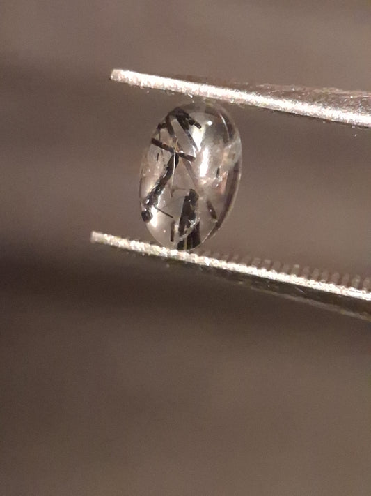 Natural Rutilated Quartz - oval cabochon - black rutile quartz - 0.475 ct