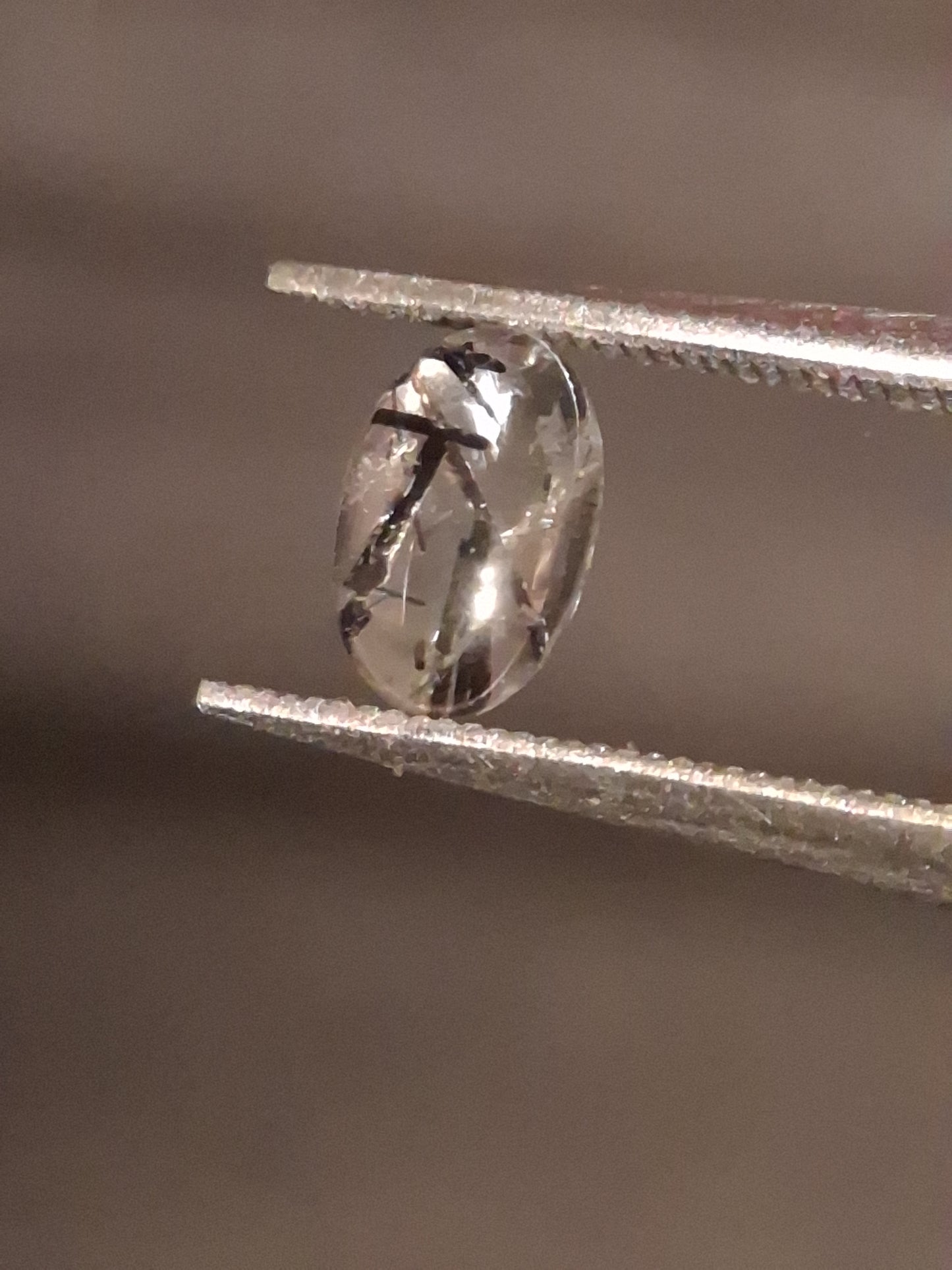 Natural Rutilated Quartz - oval cabochon - black rutile quartz - 0.475 ct