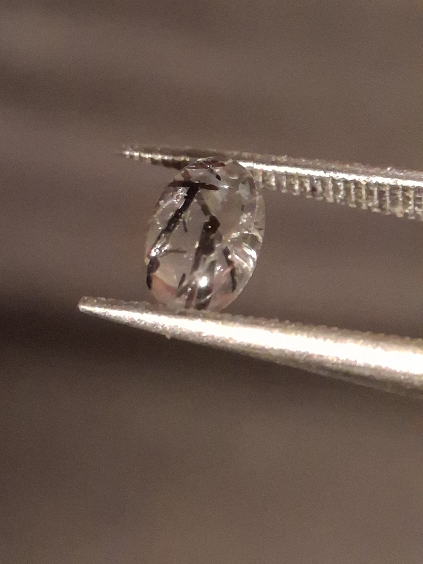 Natural Rutilated Quartz - oval cabochon - black rutile quartz - 0.475 ct