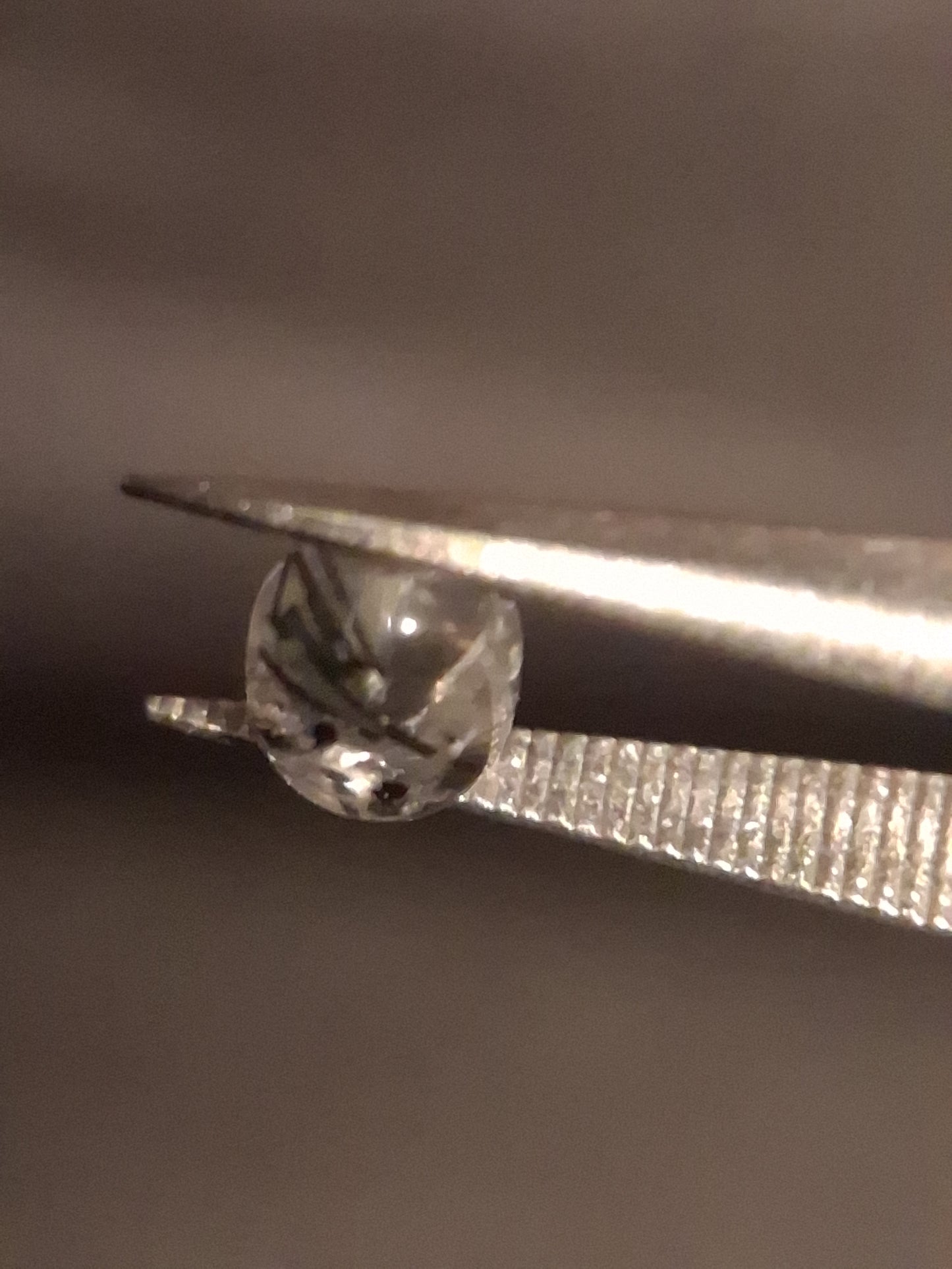 Natural Rutilated Quartz - oval cabochon - black rutile quartz - 0.475 ct