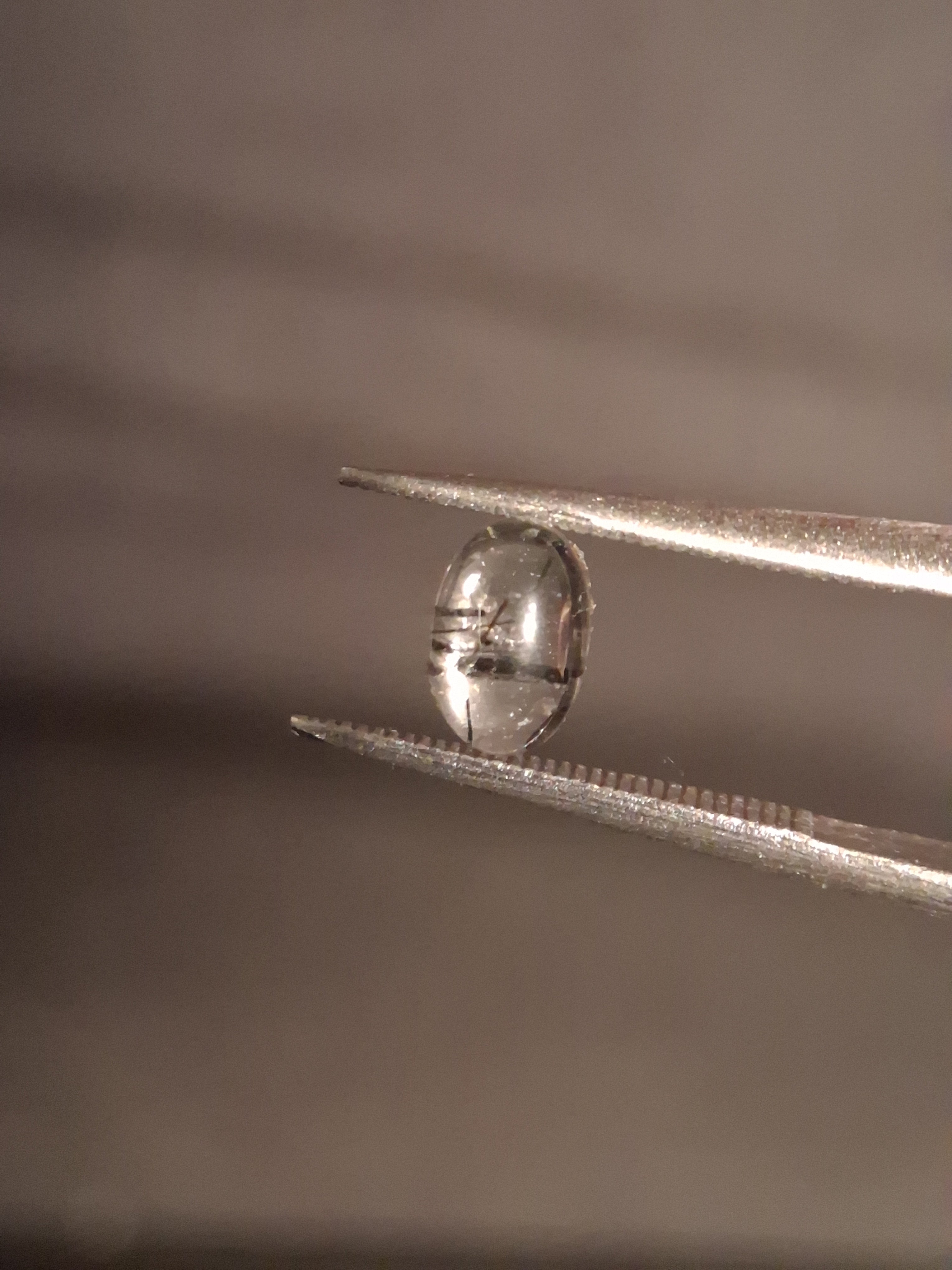 Natural Rutilated Quartz - oval cabochon - black rutile quartz - 0.490 ct