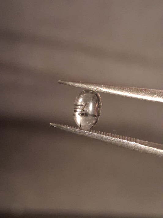 Natural Rutilated Quartz - oval cabochon - black rutile quartz - 0.490 ct