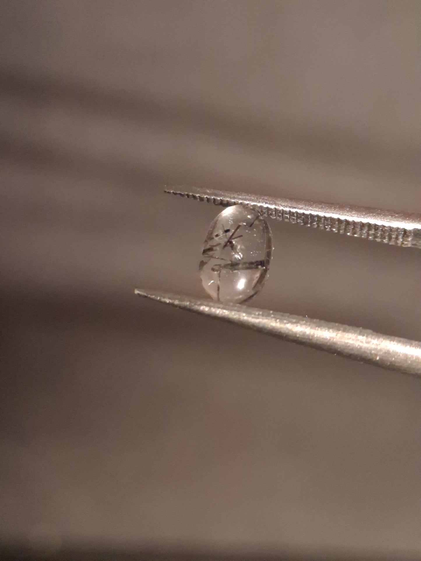 Natural Rutilated Quartz - oval cabochon - black rutile quartz - 0.490 ct