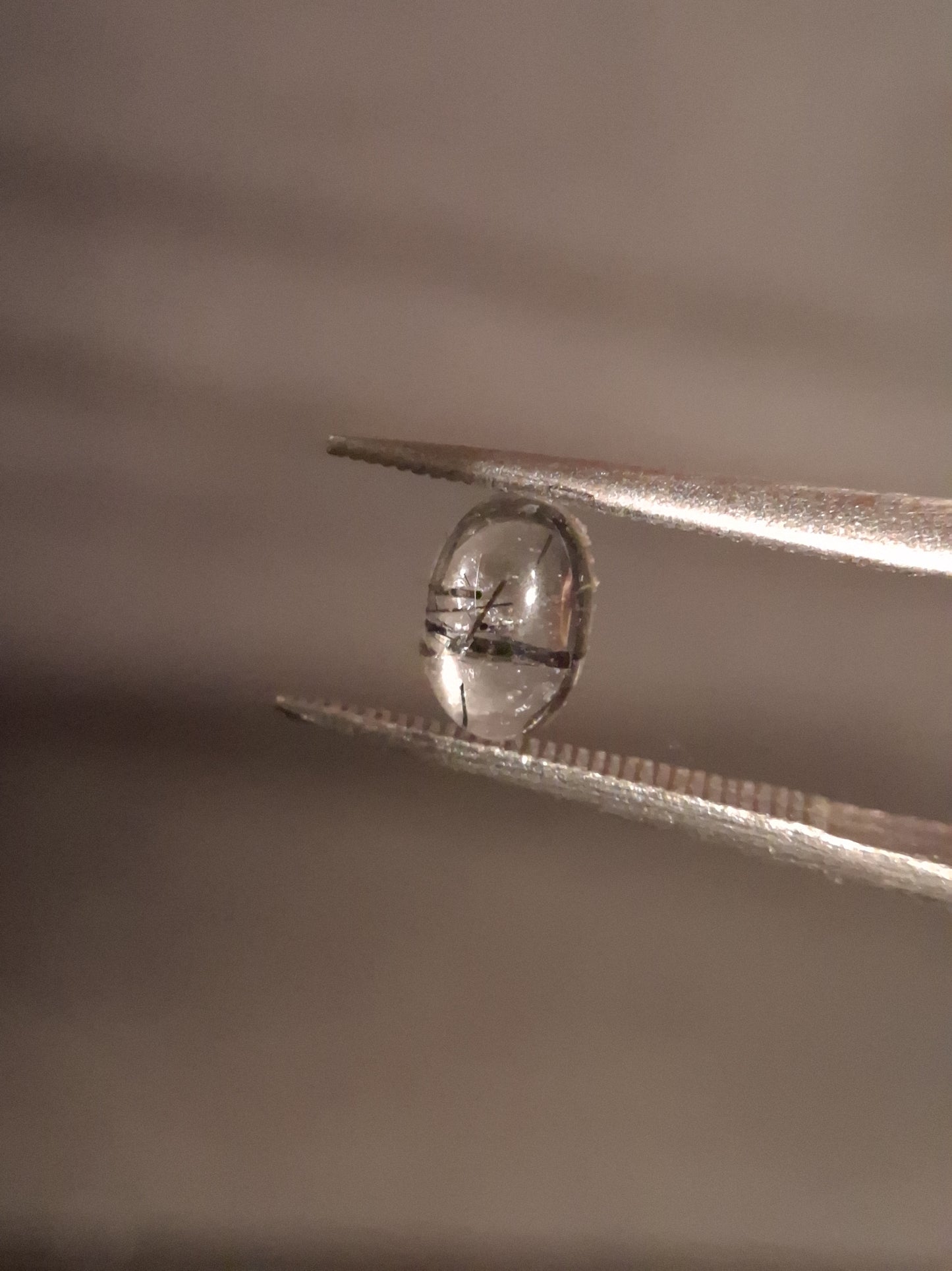 Natural Rutilated Quartz - oval cabochon - black rutile quartz - 0.490 ct