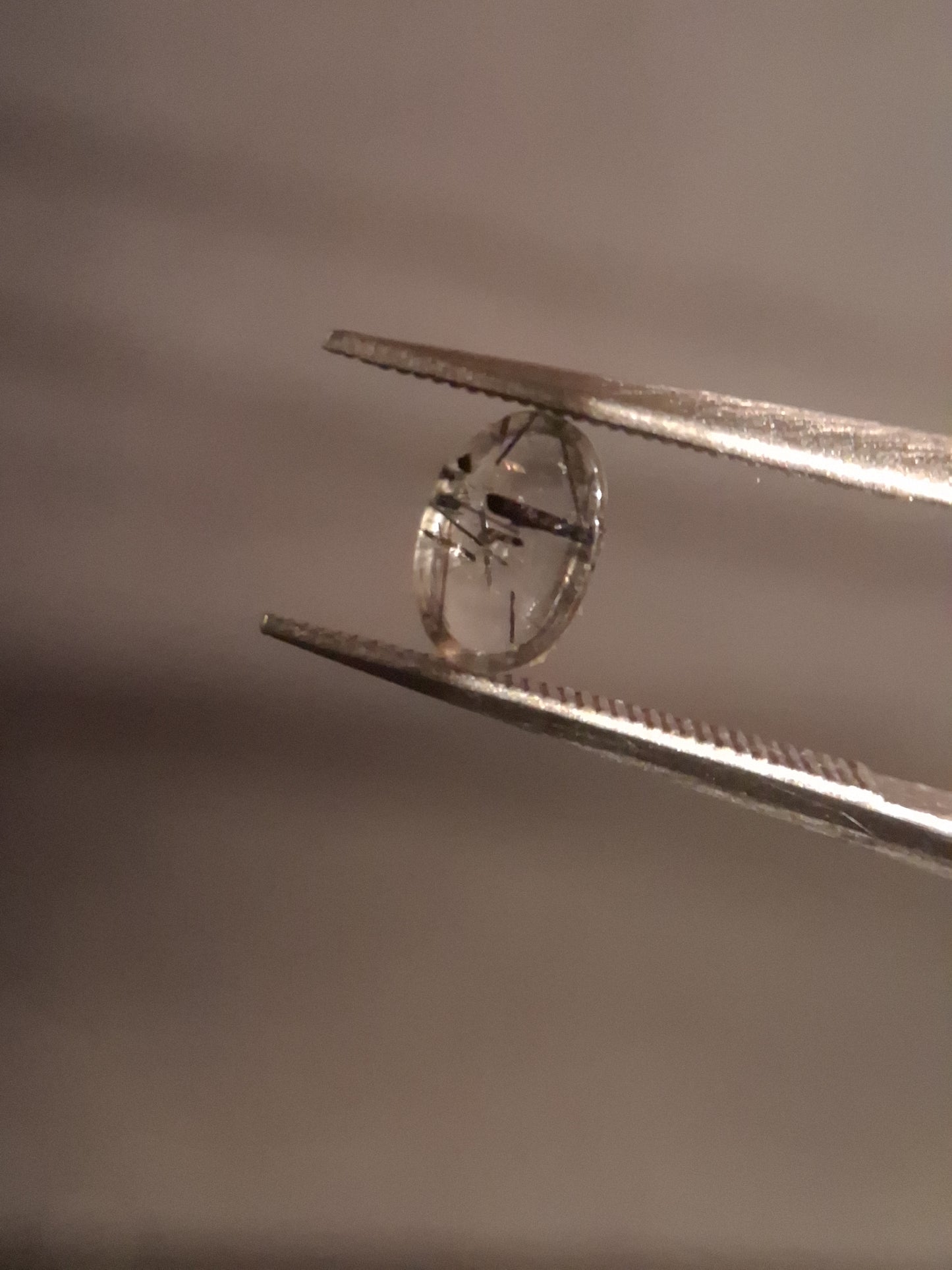 Natural Rutilated Quartz - oval cabochon - black rutile quartz - 0.490 ct