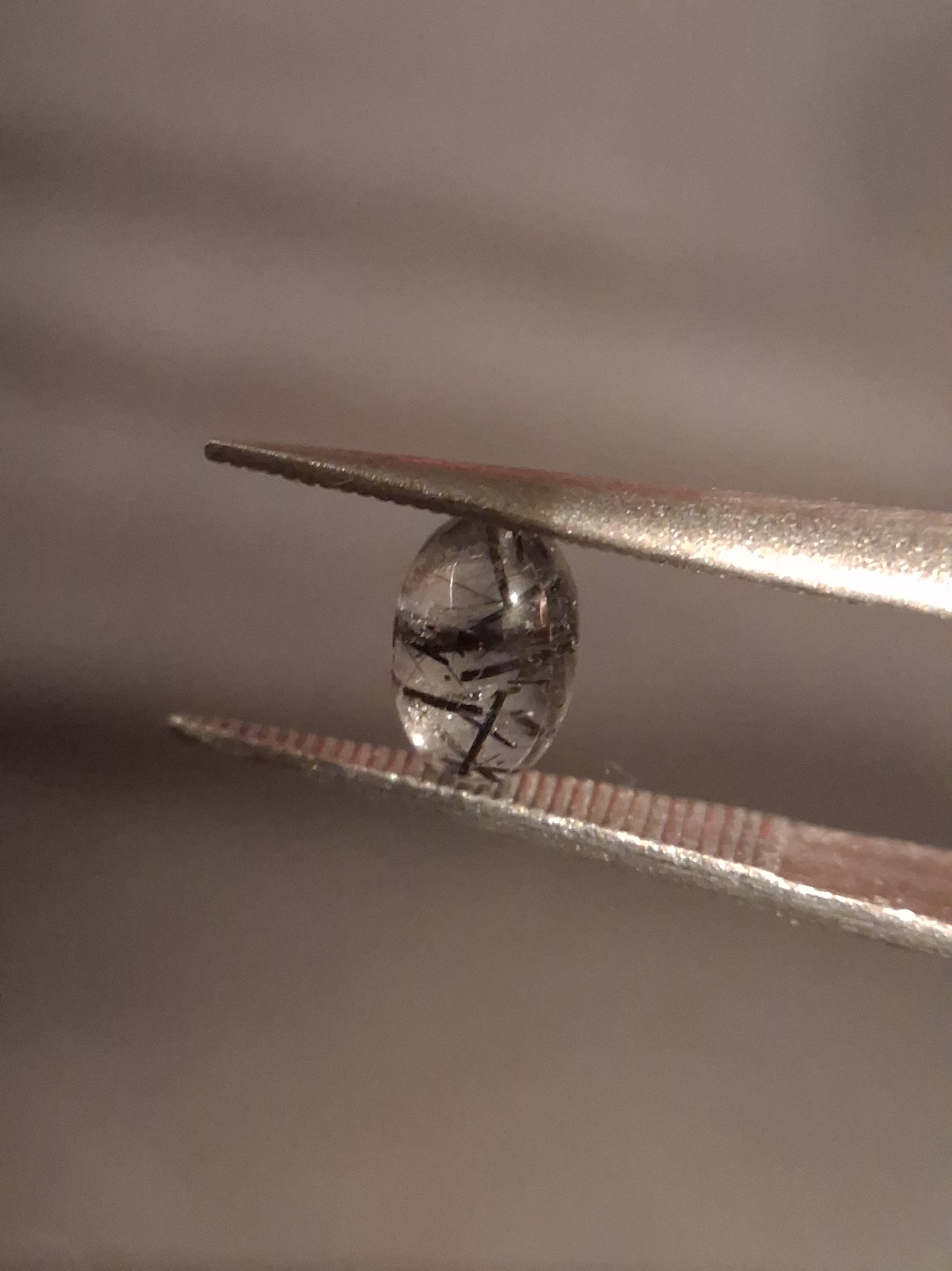 Natural Rutilated Quartz - oval cabochon - black rutile quartz - 0.485 ct