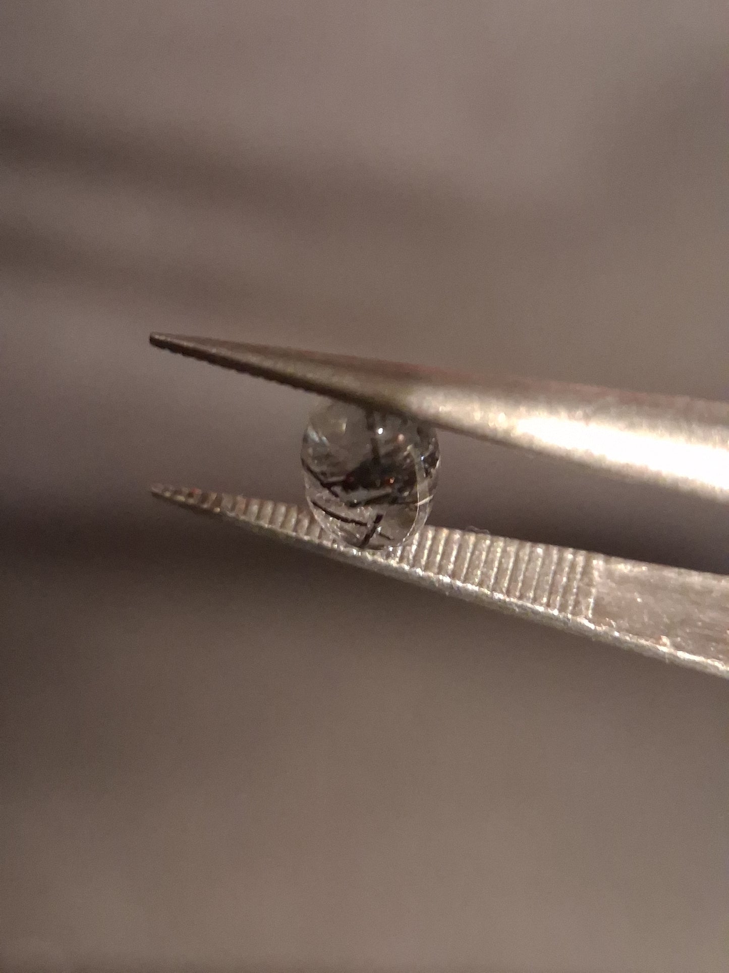 Natural Rutilated Quartz - oval cabochon - black rutile quartz - 0.485 ct