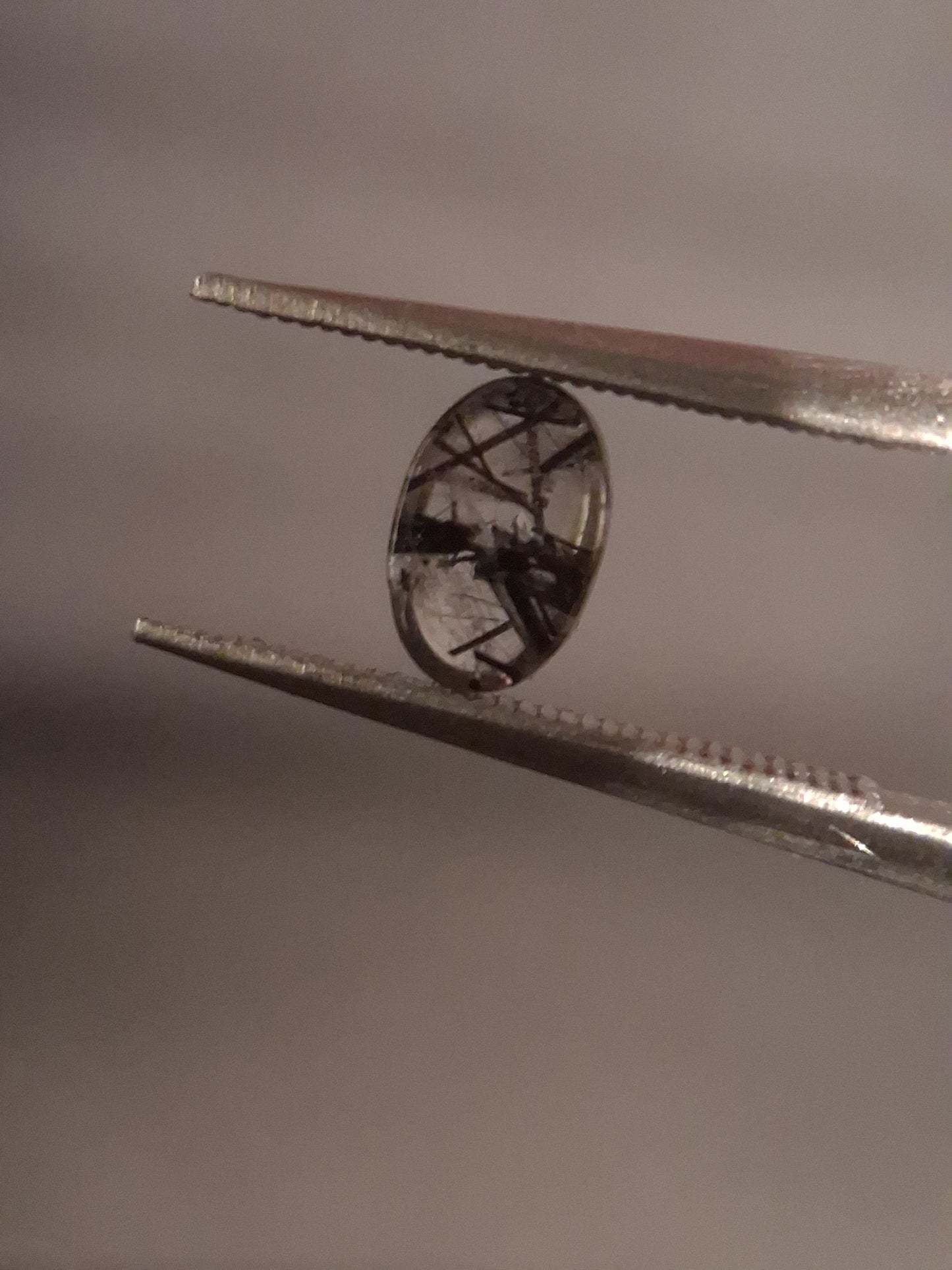 Natural Rutilated Quartz - oval cabochon - black rutile quartz - 0.485 ct