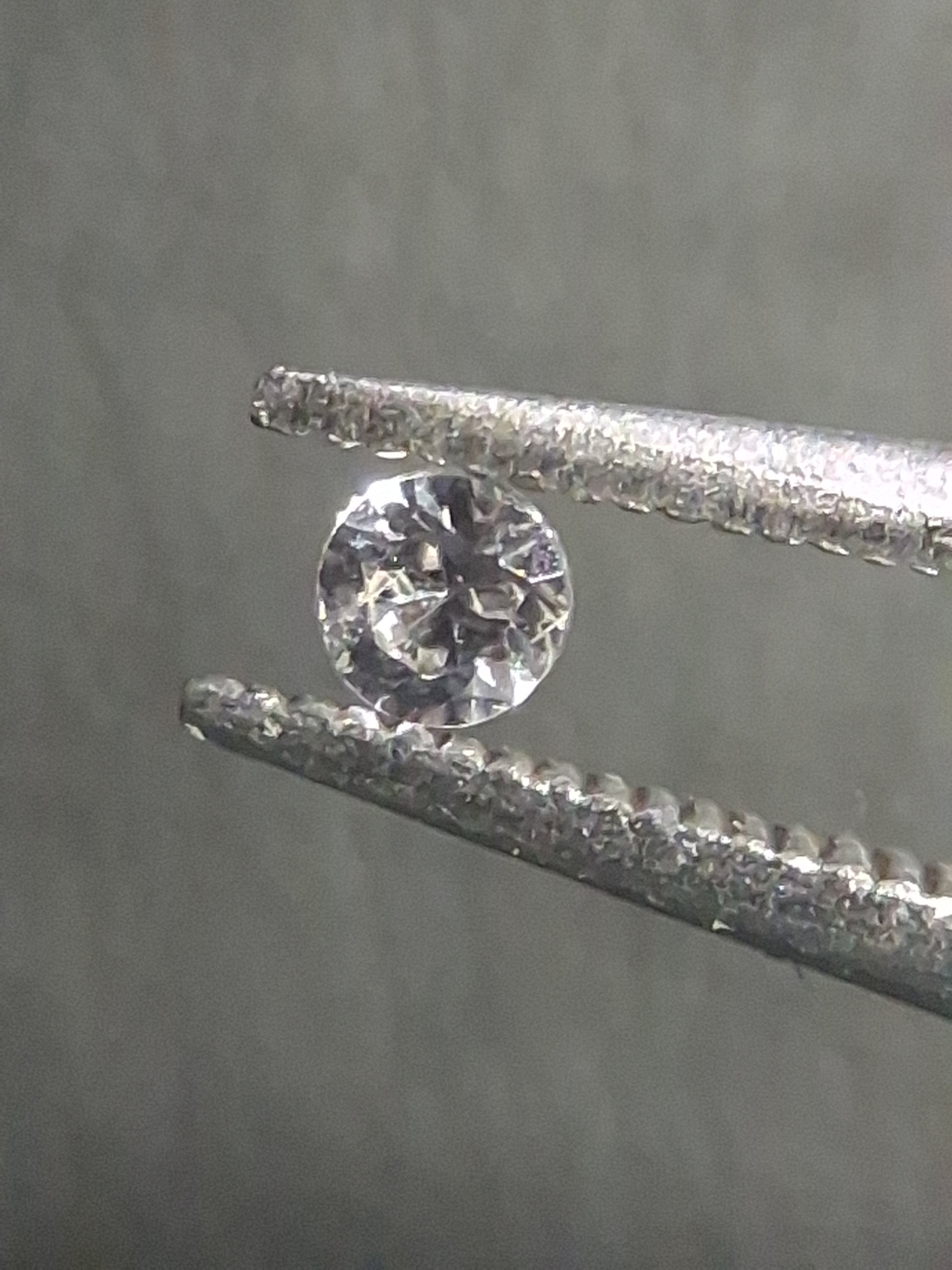 Natural White Sapphire - 0.048 ct -2 mm Round cut - heated - Africa - Natural Gems Belgium