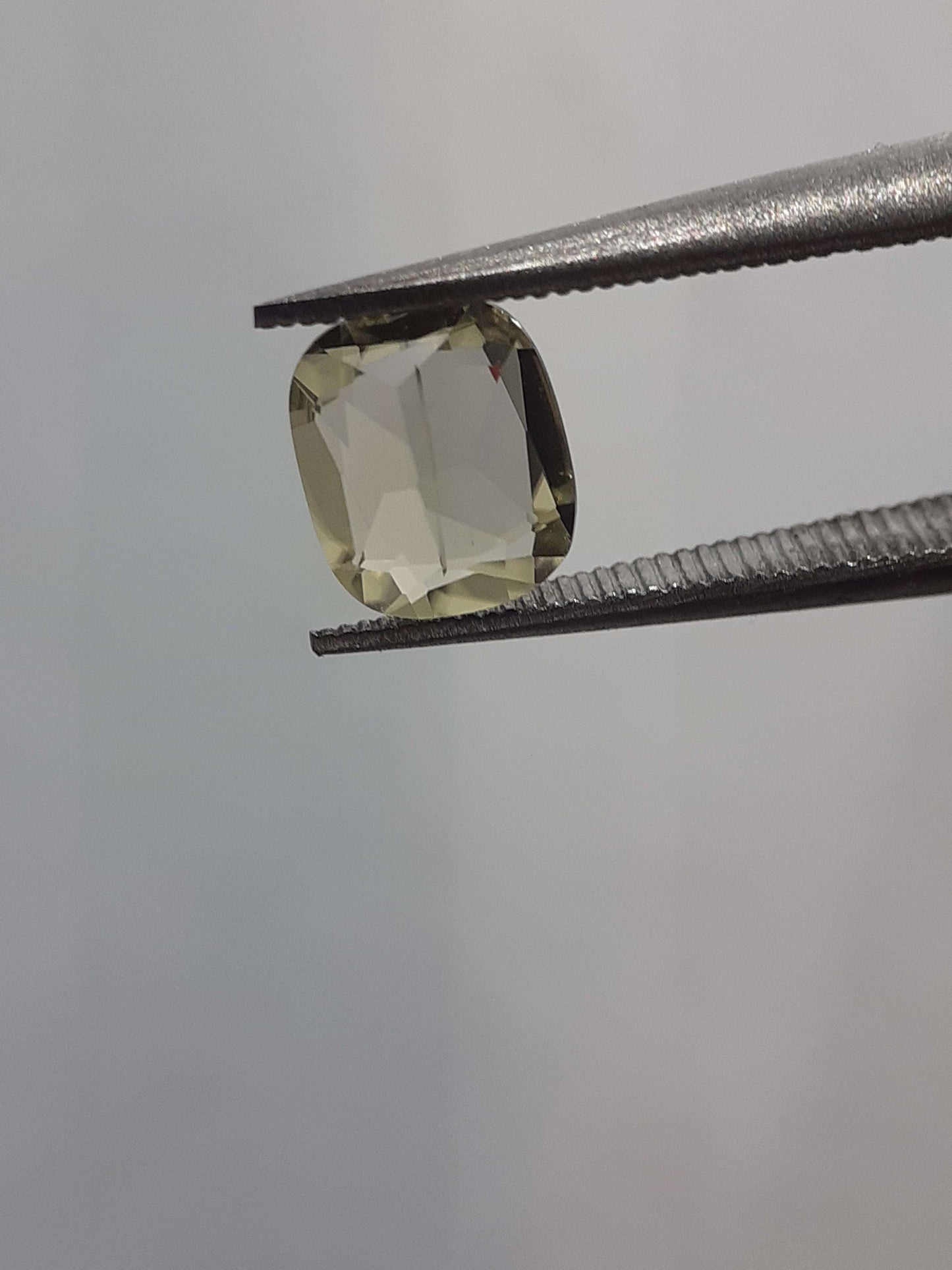 Natural Yellowish green Diaspore - 0.66 ct - Cushion - unheated - needle inclusion - certified by NGB All Diaspore Gemstones - Faceted Diaspore Natural Gems Belgium