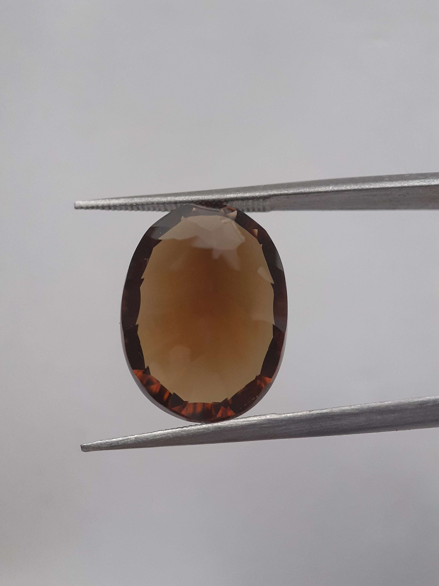 Natural honey yellow Citrine - 8.625 ct - oval custom cut - reddish orange hues All Citrine Gemstones - Faceted Citrine Natural Gems Belgium