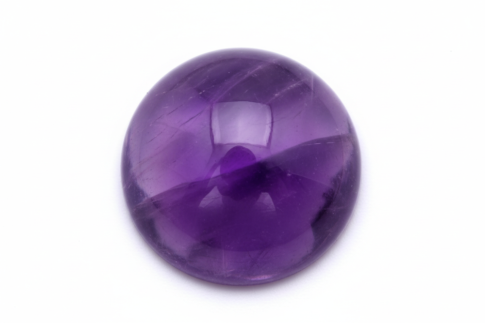 Amethyst cabochon round shaped white background