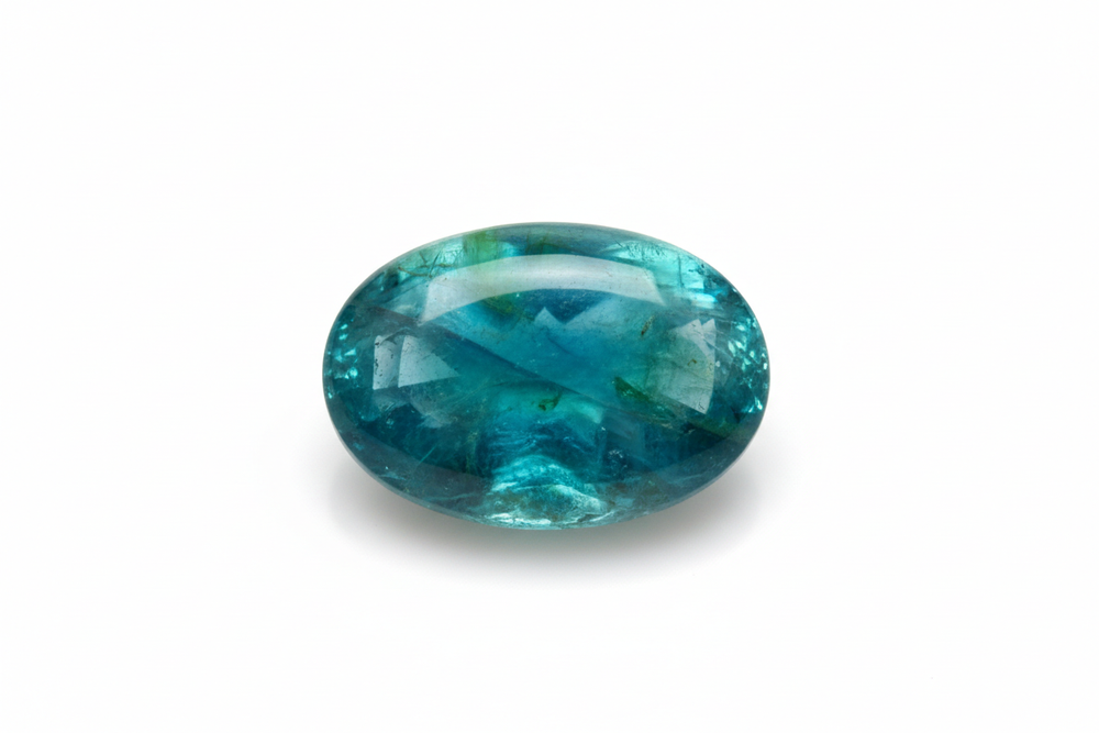 apatite cabochon oval white background