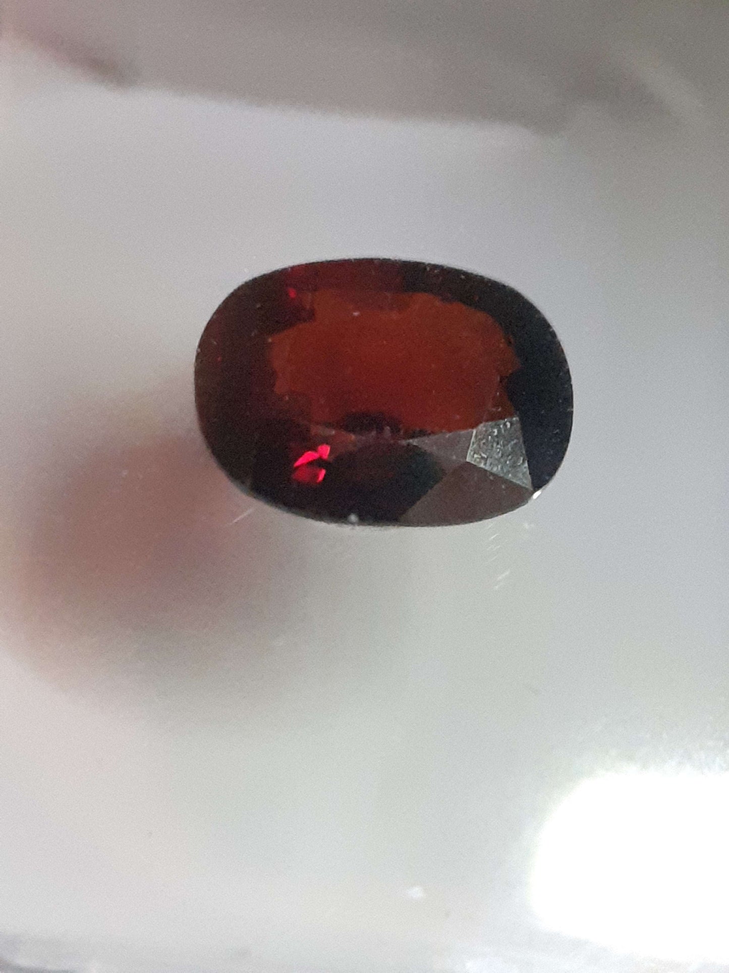 Certified orangy red Spessartite Garnet - 1.17 ct oval  - Sealed - Natural Gems Belgium